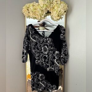 White House Black Market Asymmetrical Black White Blouse can be used mini dress
